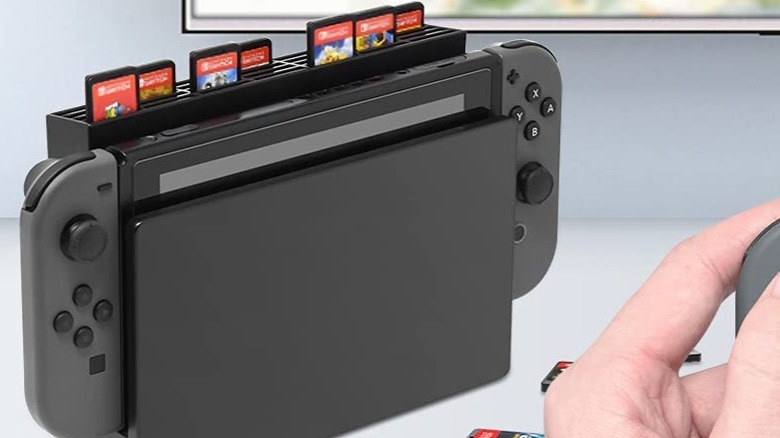 Nintendo Switch docked with cartridges