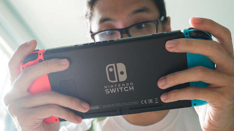 Excited gamer playing Switch