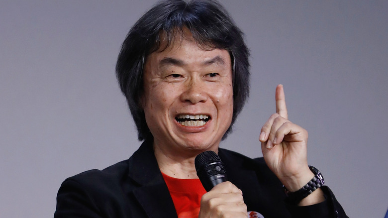 Shigeru Miyamoto pointing up