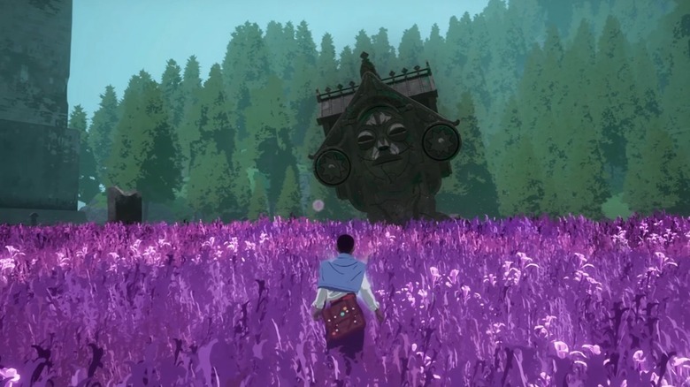Man walks through purple field