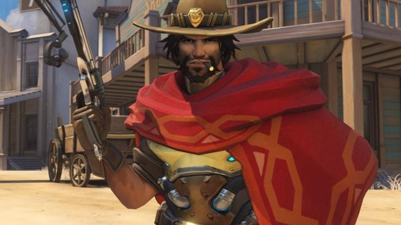 McCree holds gun