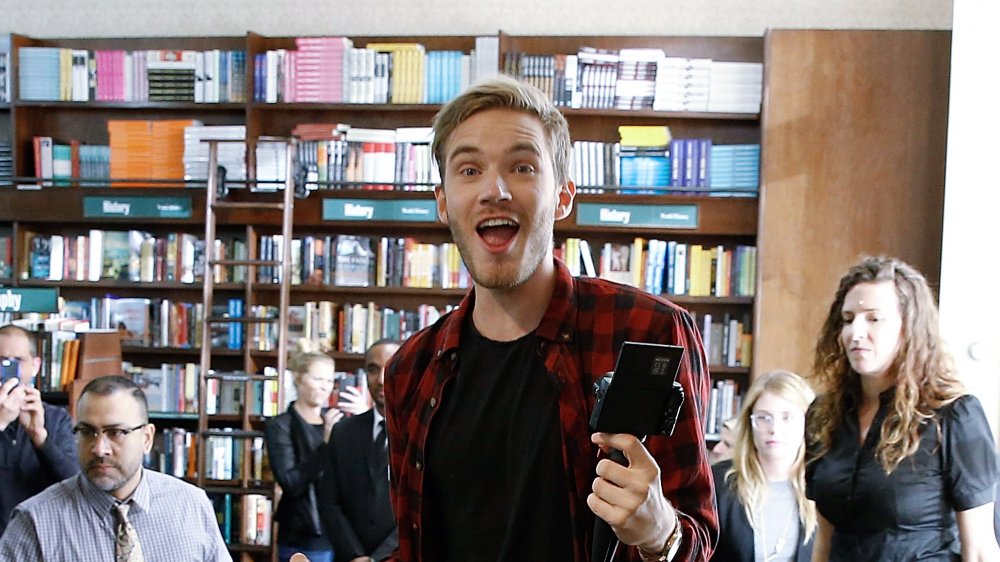 PewDiePie signing copies of his book 