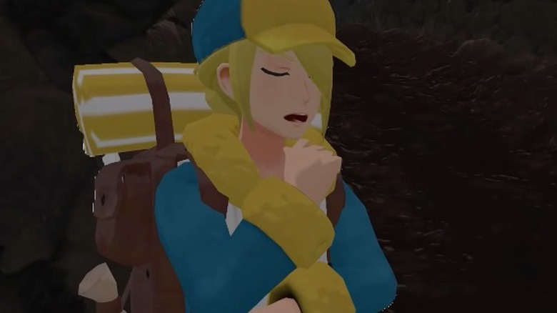Volo dressed in blue and gold with closed eyes and hand on chin