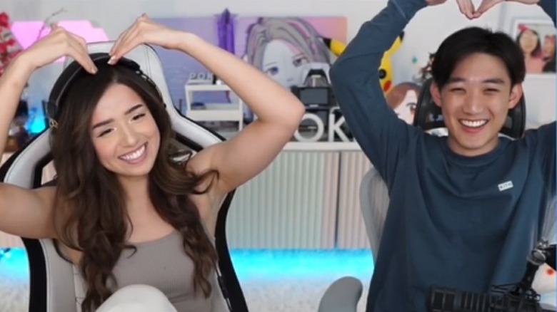 Pokimane and friend Kevin heart arms