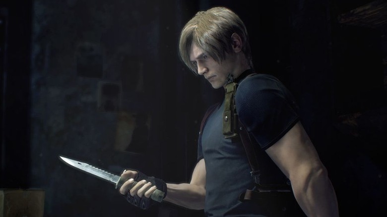 Leon looking thoughtfully at knife