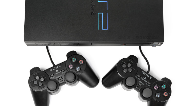 PlayStation 2 with two controllers
