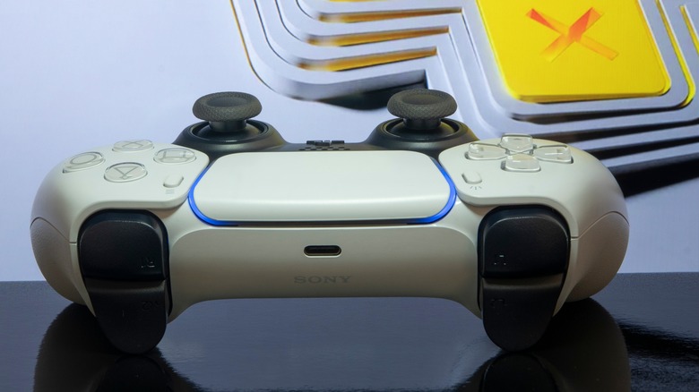 PlayStation Plus logo and controller