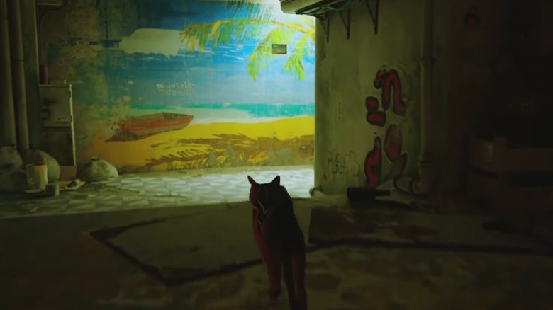 Cat looking at beach mural