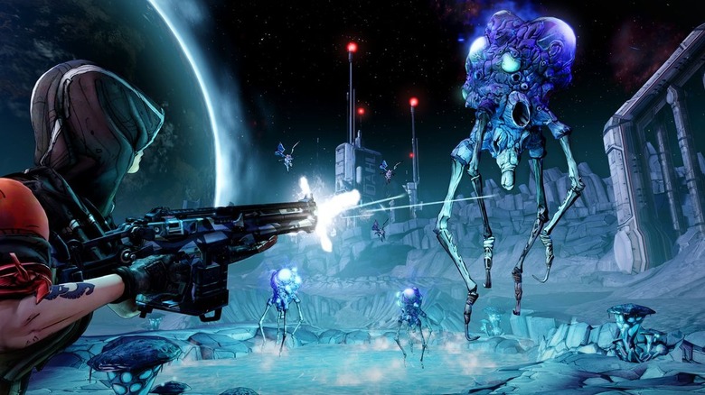 Player shooting alien creatures on moon