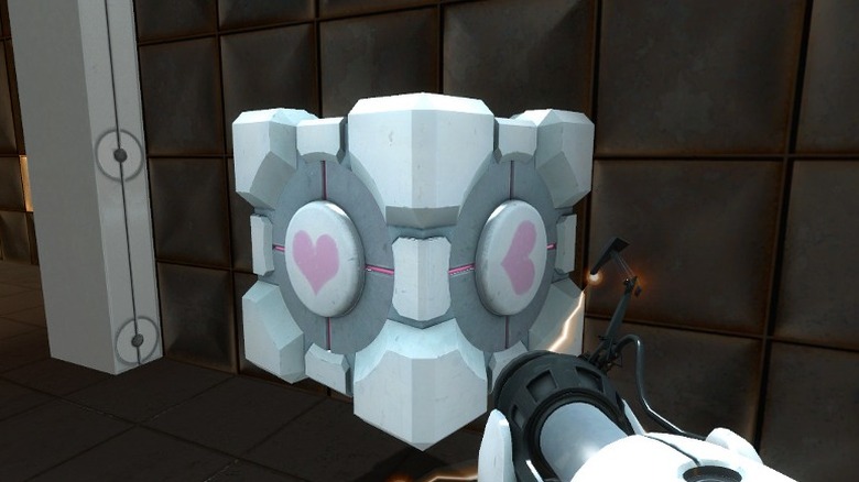 Player holding the Companion Cube