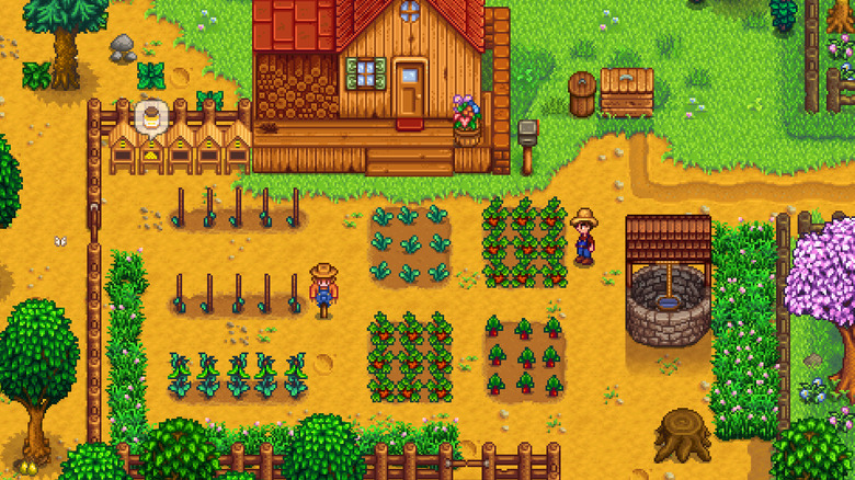 farm with crops in front of house