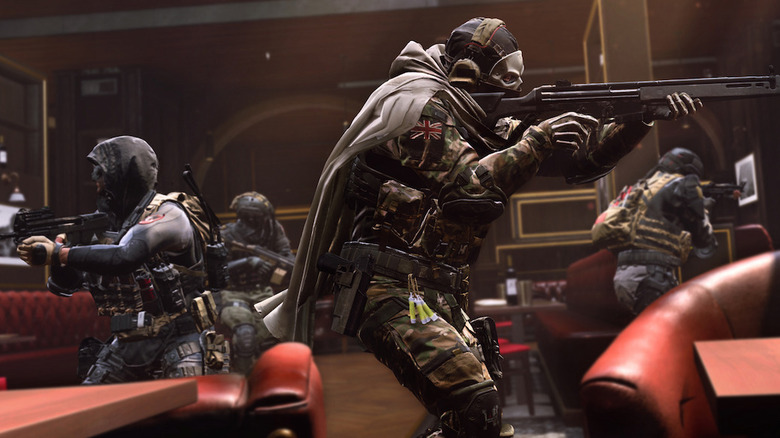 Four operators moving through a room