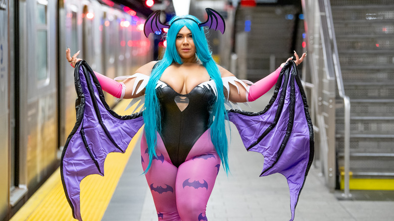 Morrigan raises arms