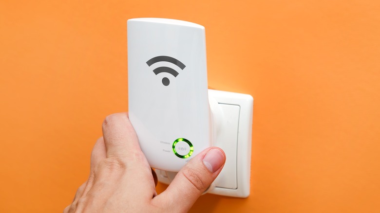 WiFi repeater plugged in wall
