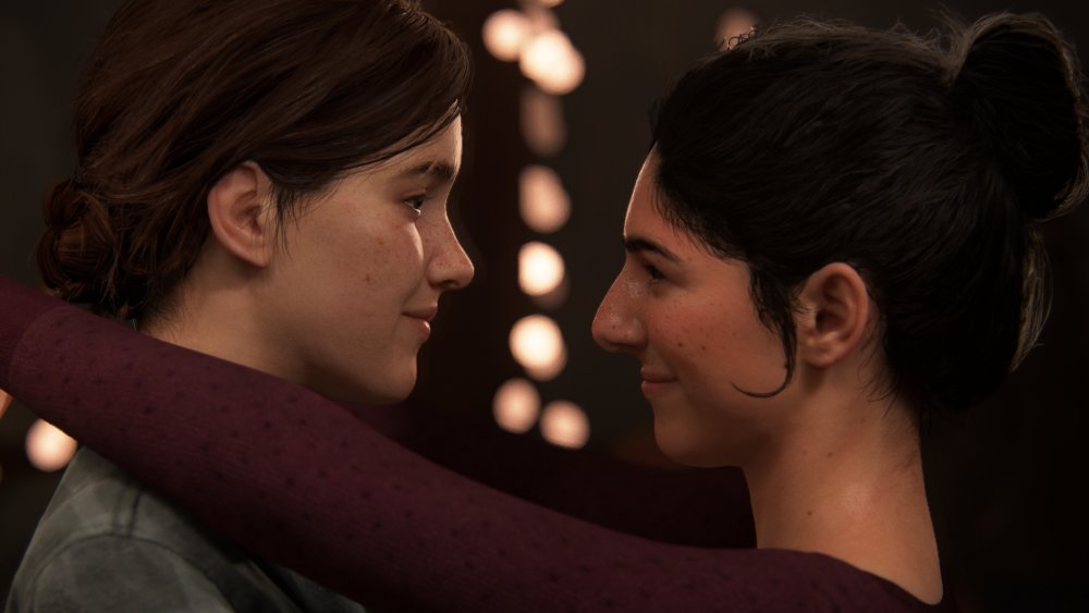 Ellie and Dina from The Last of Us Part 2 embrace