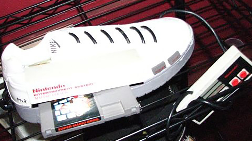 A functional Nintendo Entertainment System built into a Nike sneaker