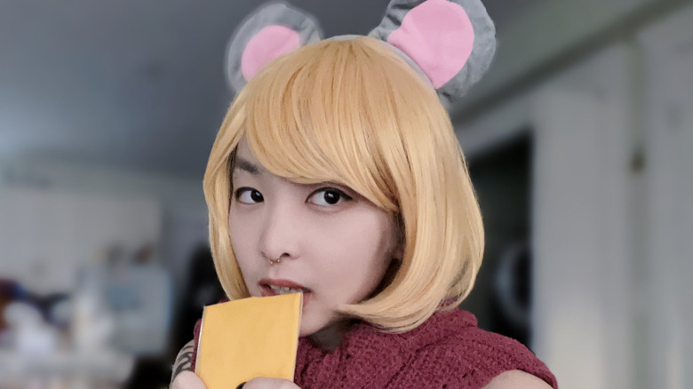 Cosplayer as Mouseley eating cheese