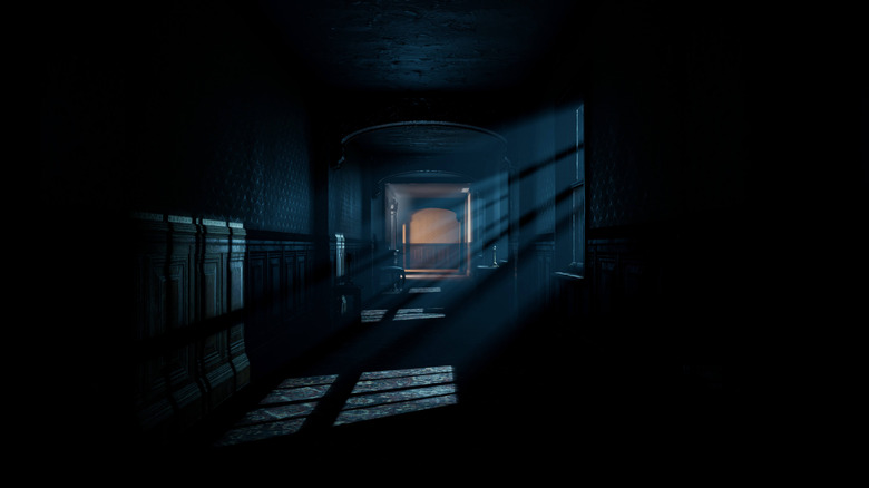 Spooky hallway with shadows and shafts of light