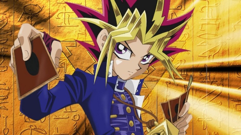 Yugi dueling cards