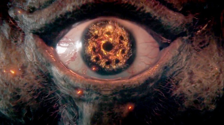 Eye with fire reflection close up