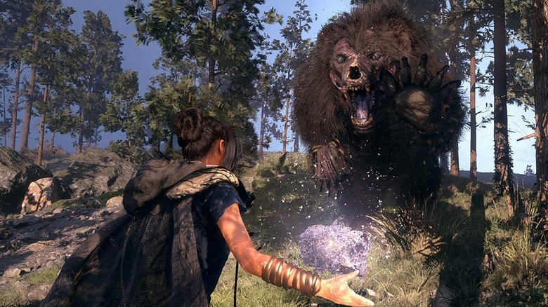 Forspoken Frey fighting bear