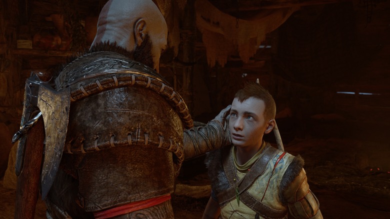 Atreus and Kratos talking by the fire