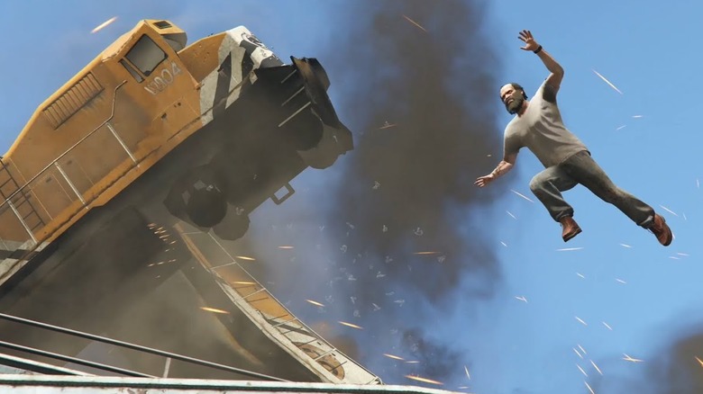 Trevor leaps as the train wrecks