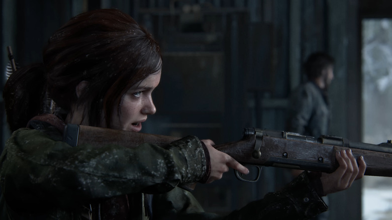 Ellie aiming a gun