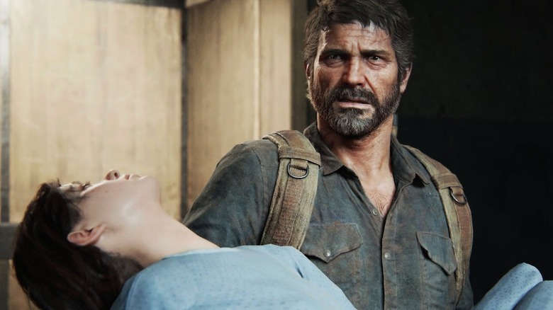 Joel carries Ellie hospital