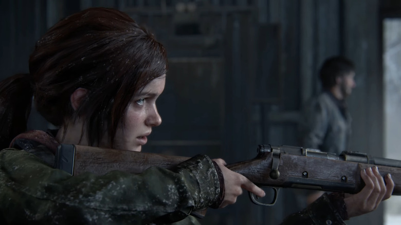Ellie aiming a shotgun