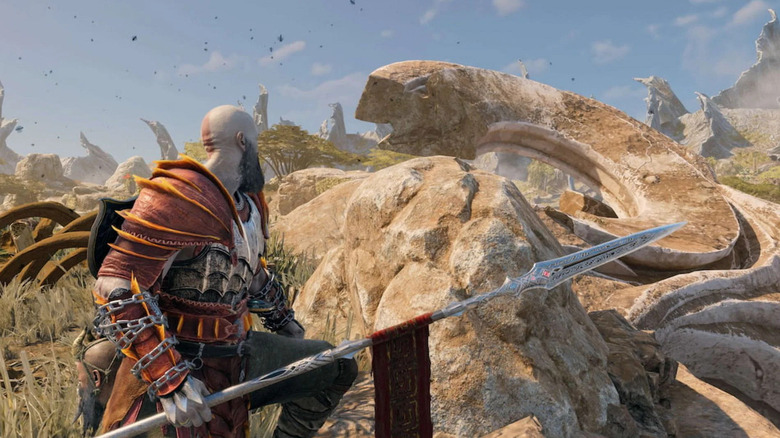 Kratos holding the Draupnir Spear