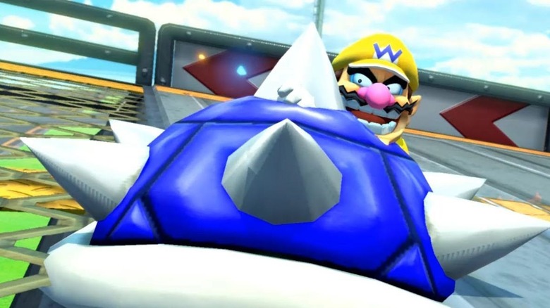 Wario deploys the blue shell