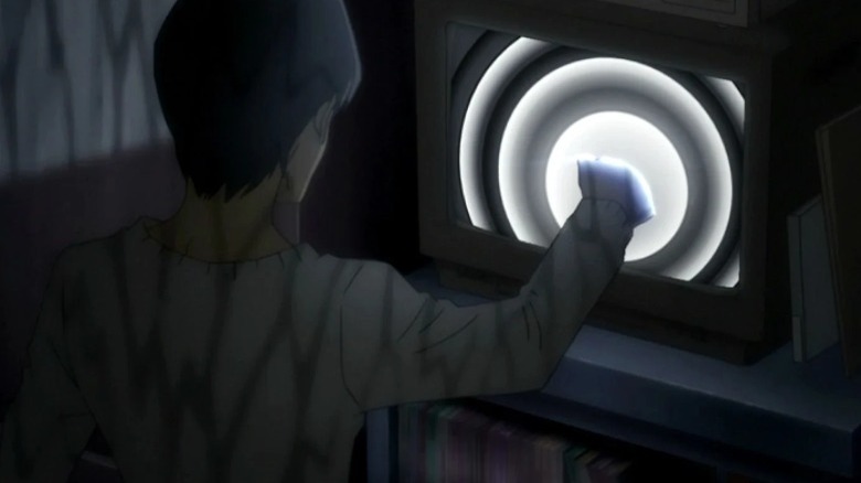 Persona 4 protaginist reaching into a TV