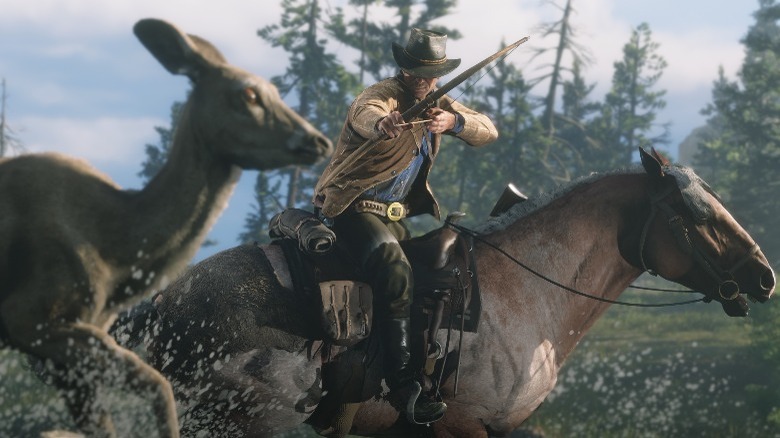 Arthur preparing to shoot a deer