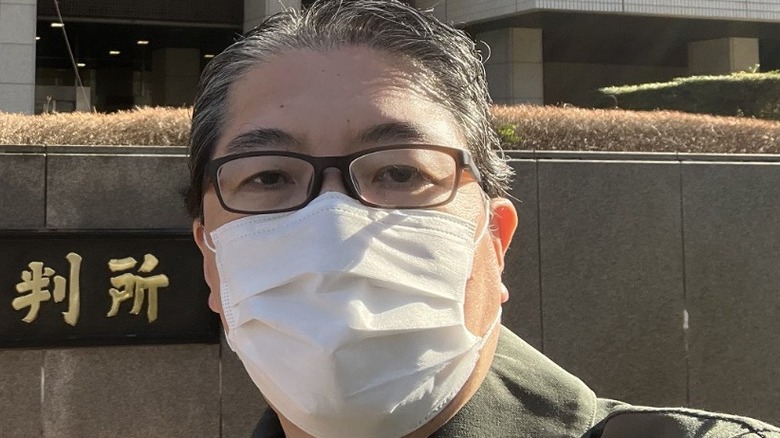 Yuji Naka wearing mask