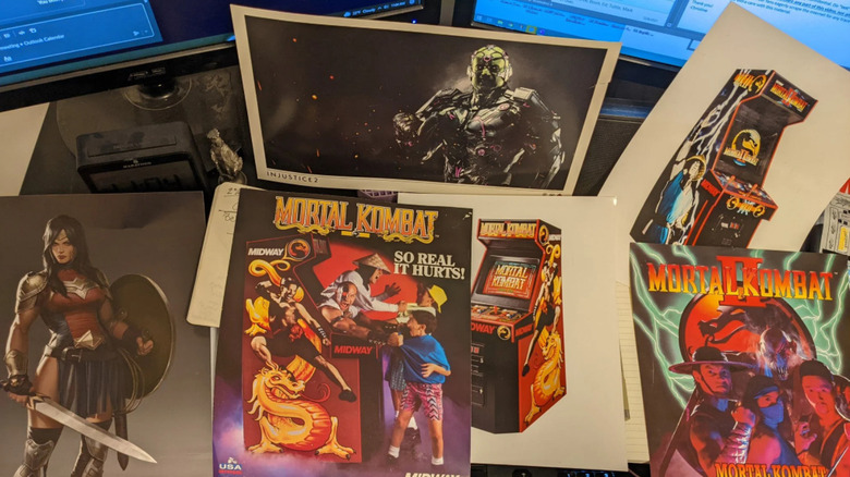 Photo of desk and Mortal Kombat artwork