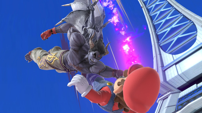 Kazuya punches Mario