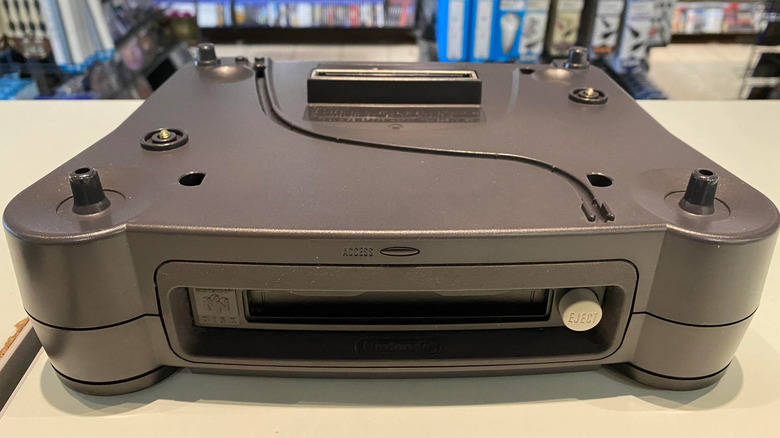 Modern Nintendo 64DD console on table