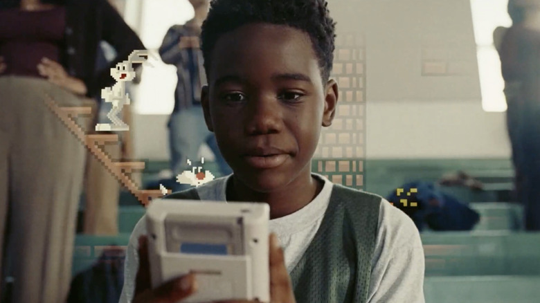Young LeBron James plays Game Boy