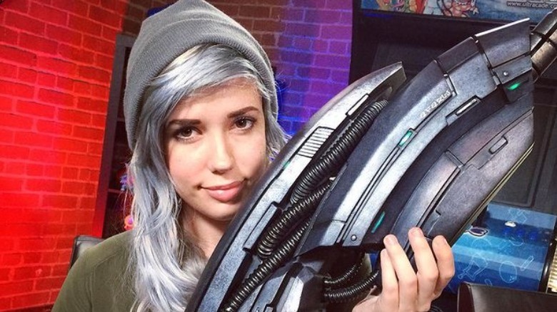 Alanah Pearce with Mass Effect gun