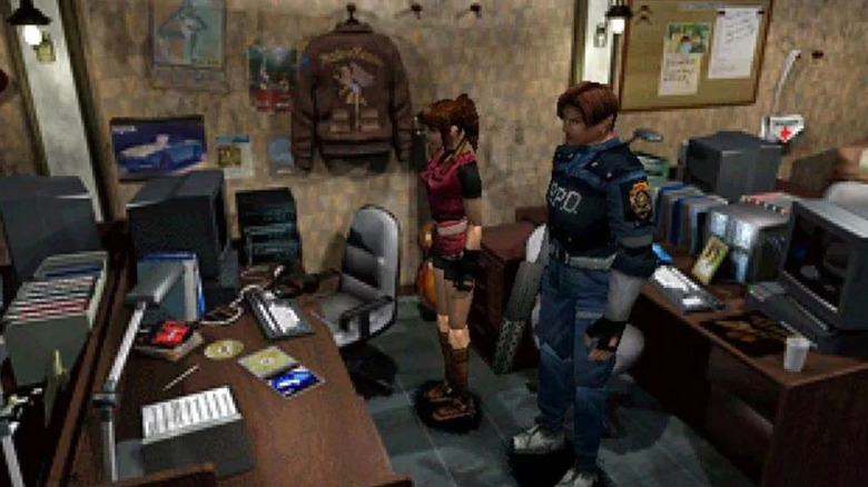 Leon Kennedy and Claire Redfield standing at desk