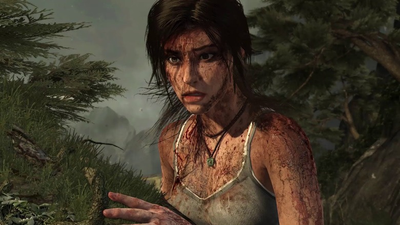 Lara is covered in blood