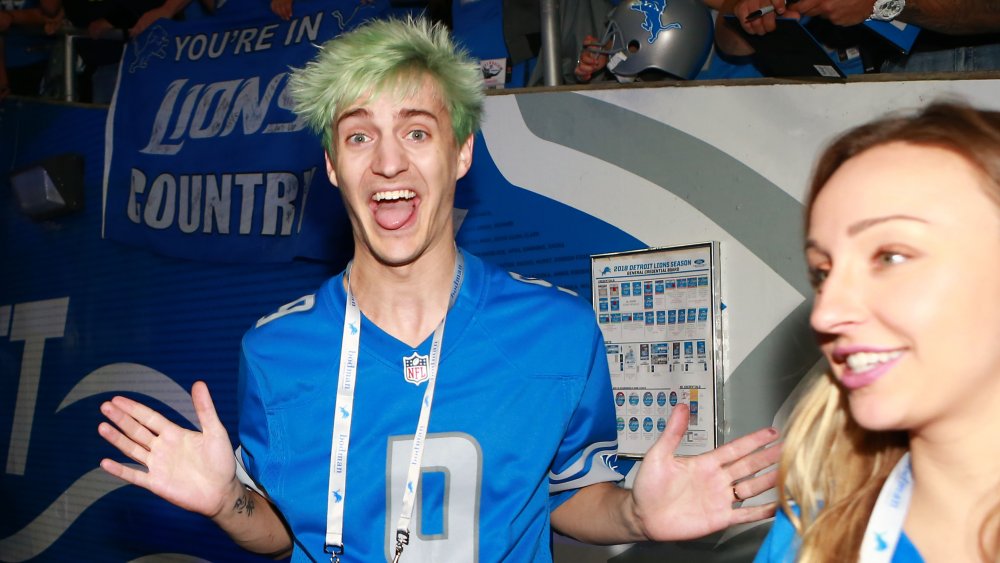 Ninja attends a sports event with his wife Jess