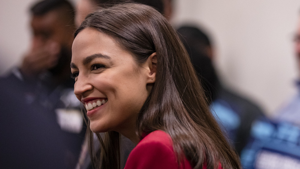 alexandria ocasio cortez smiling