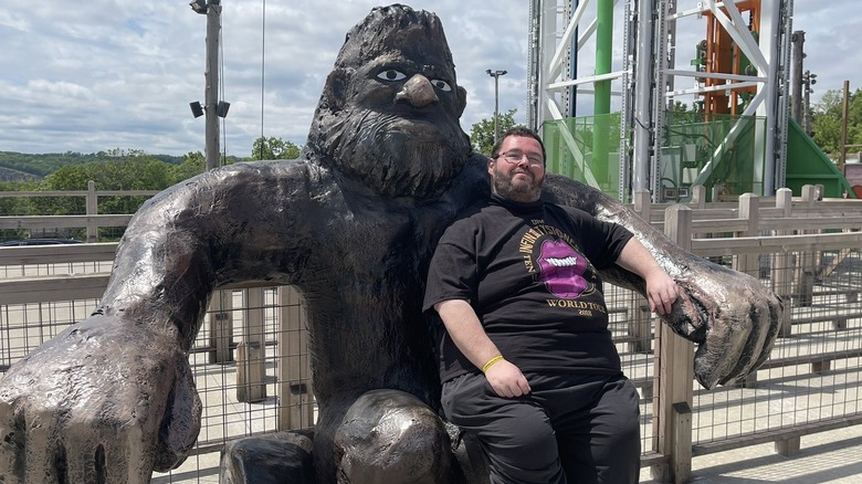 Williams poses with ape statue