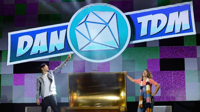  DanTDM and another performer at a live event