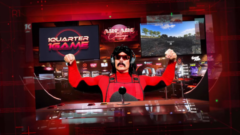 Dr. Disrespect flexing in front of game stick