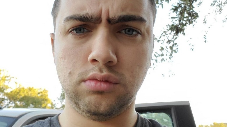 Mizkif taking selfie outside