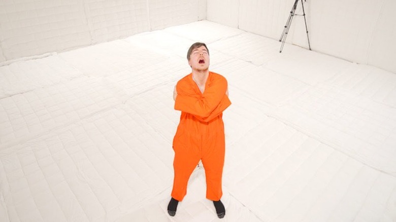 MrBeast wearing orange jumpsuit