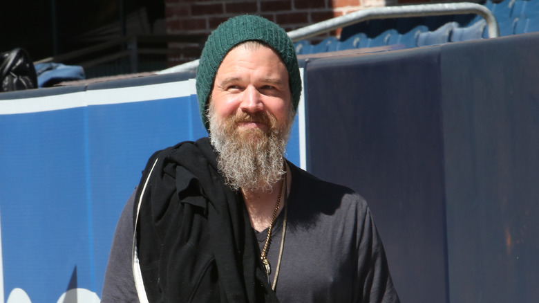 Ryan Hurst smiling wearing beanie